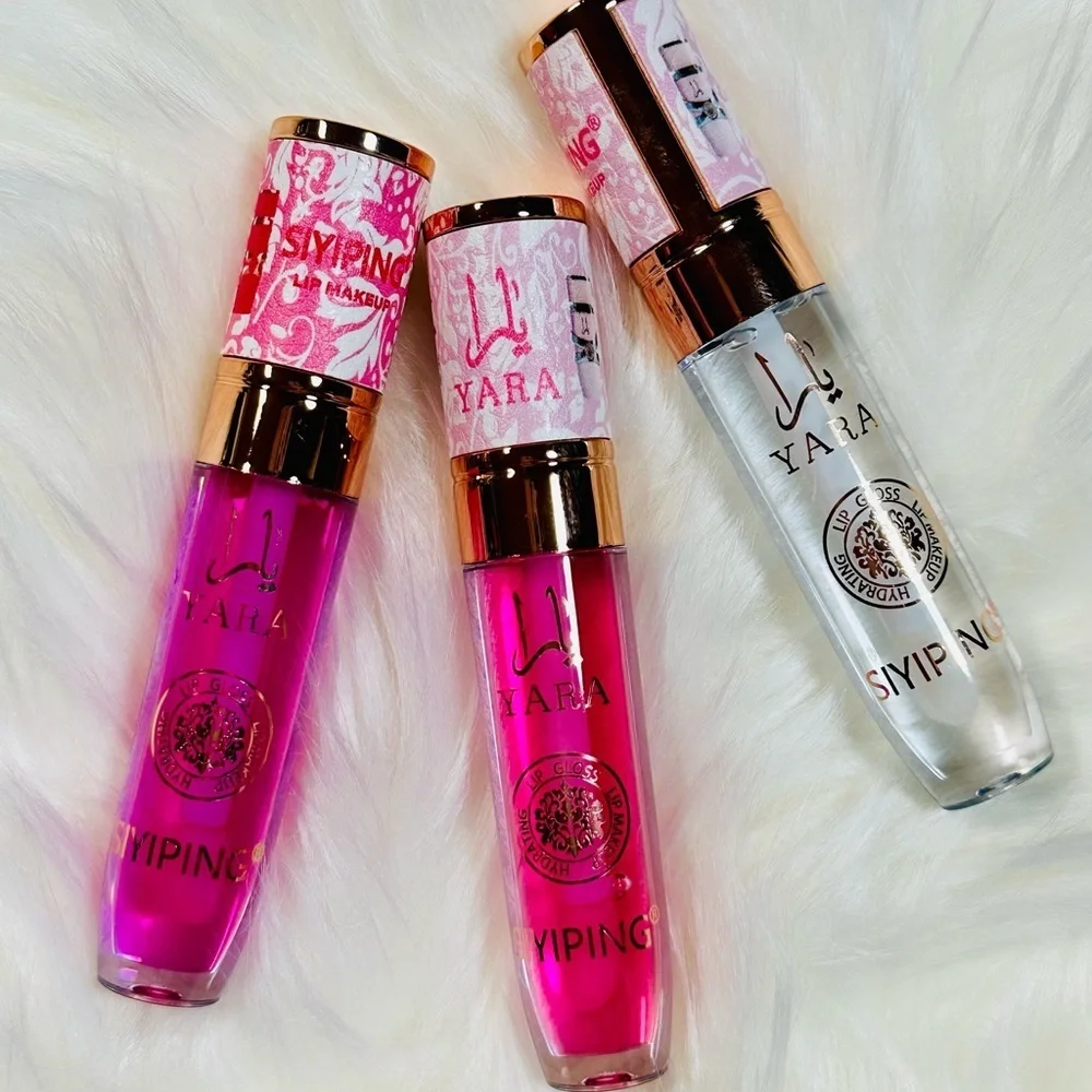 Pink, purple and Clear Lip Gloss trio